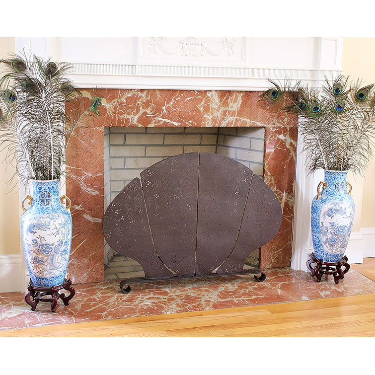 Retrofitting summer? This fireplace screen turns cold nights into secret blazes with a secret no one knows